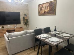 Телевизор и/или развлекательный центр в Casa Toñi