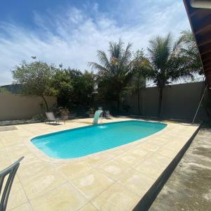 Πισίνα στο ή κοντά στο Chacara a 10 minutos dá Basílica de Aparecida-sp