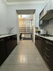 Η κουζίνα ή μικρή κουζίνα στο Guest House - Manandyan 20