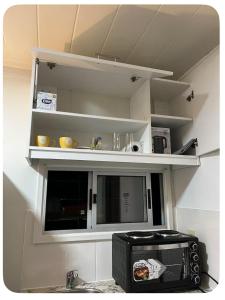 Kuchyň nebo kuchyňský kout v ubytování Urban Nest