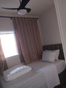 Postel nebo postele na pokoji v ubytování Casa completa aconchegante