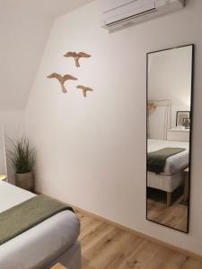 Postel nebo postele na pokoji v ubytování Interno12 Luminoso bilocale tra i tetti