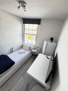 Voodi või voodid majutusasutuse Room for 5 in Zone 2 - Willesden Green toas