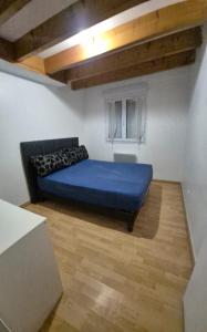 Ένα ή περισσότερα κρεβάτια σε δωμάτιο στο Maison au cœur des vignes