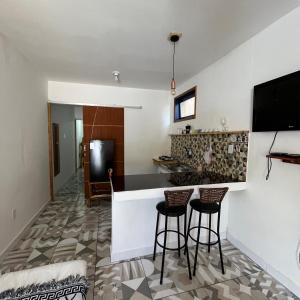 TV a/nebo společenská místnost v ubytování Casinhas da toca