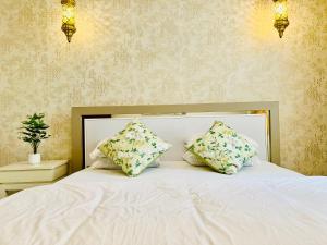 Postel nebo postele na pokoji v ubytování The look