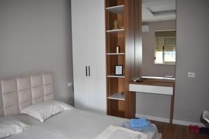 En eller flere senge i et værelse på Fictus Stay