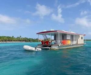 a house boat in the middle of the water at Aqua Lodge, Les Saintes, Terre de Haut, Guadeloupe in Terre-de-Haut