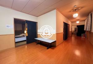 Un pat sau paturi într-o cameră la 鈴籠城 城の間 ダブルベッド2台 二段ベッド1台 +8 fotografii