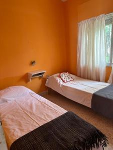 Ένα ή περισσότερα κρεβάτια σε δωμάτιο στο La Clementina 2