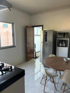 Kuchyň nebo kuchyňský kout v ubytování Apartamento em Bom Despacho-MG