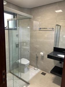 Koupelna v ubytování Apartamento em Bom Despacho-MG + 14 fotografií