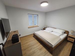 Ένα ή περισσότερα κρεβάτια σε δωμάτιο στο EIRA Apartament - Self check-in