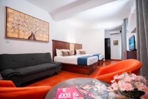 Ένα ή περισσότερα κρεβάτια σε δωμάτιο στο Hotel del Carmen, en el Centro- DESAYUNO Incluido ! +47 φωτογραφίες