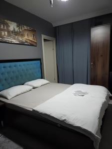 En eller flere senge i et værelse på 216 Blue Life + 9 billeder