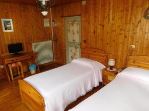 Postel nebo postele na pokoji v ubytování Antico Albergo Sant'Antonio