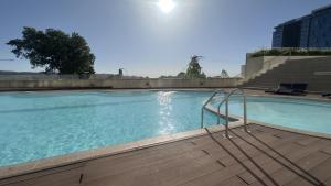 Bassein majutusasutuses Oceana Suites en Concepción või selle lähedal