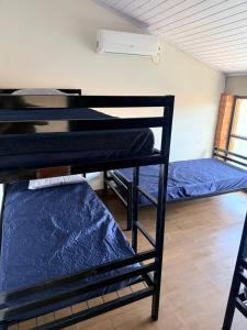 Postel nebo postele na pokoji v ubytování Rancho Del Sole