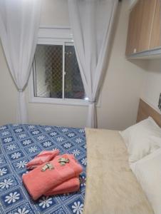 Ένα ή περισσότερα κρεβάτια σε δωμάτιο στο Próximo autódromo de interlagos há 450 metros +57 φωτογραφίες