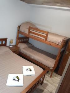 Postel nebo postele na pokoji v ubytování Cafayate suite + 4 fotografie