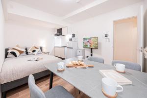 Kuchyň nebo kuchyňský kout v ubytování 西武新宿線徒歩三分 ZAITO Shimoochiai Stay