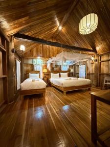 Postel nebo postele na pokoji v ubytování Sook Village