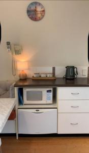 Kuchyň nebo kuchyňský kout v ubytování Serentiy & Sea at Footprints Resort