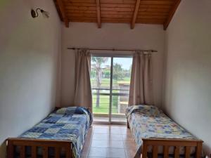 Postel nebo postele na pokoji v ubytování La casa del lago + 6 fotografií