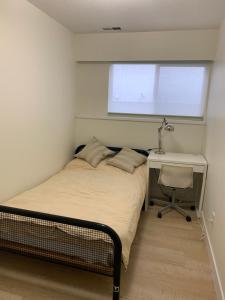 Ένα ή περισσότερα κρεβάτια σε δωμάτιο στο Modern 2-Bedroom suite