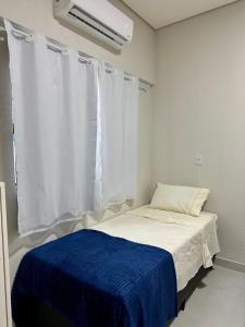 Ένα ή περισσότερα κρεβάτια σε δωμάτιο στο Hotel União Centro +5 φωτογραφίες