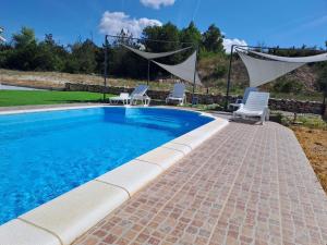 Bazén v ubytování Nane Garden house with heat pool nebo v jeho okolí + 11 fotografií