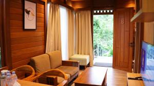 Μια τηλεόραση ή/και κέντρο ψυχαγωγίας στο Eusabeia Villa And Hot Spring Water