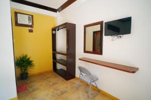 Et tv og/eller underholdning på Ocean 202 Homestay