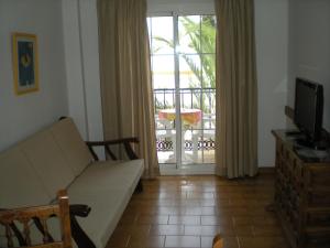 Μια τηλεόραση ή/και κέντρο ψυχαγωγίας στο Apartamentos Casanova