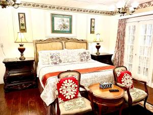 Ένα ή περισσότερα κρεβάτια σε δωμάτιο στο Barker House 1# Suite-heart of oldtown