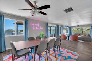a dining room with a table and chairs at New Sonoran Oasis pool hot Tub Sleeps 12 in Tucson