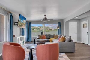 a living room with a couch and chairs at New Sonoran Oasis pool hot Tub Sleeps 12 in Tucson