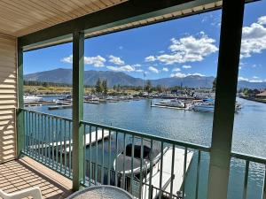 a balcony with a view of a marina with boats at 439 Ala Wai, 119 condo in Lake Valley