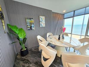 Fotografie z fotogalerie ubytování Musselana Beachfront Luxury Suite v destinaci Jomtien pláž