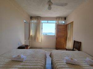 Postel nebo postele na pokoji v ubytování Acogedor departamento con vista al mar