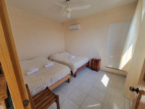 Postel nebo postele na pokoji v ubytování Acogedor departamento con vista al mar