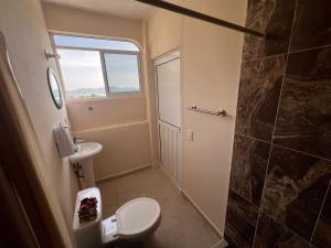 Koupelna v ubytování Acogedor departamento con vista al mar