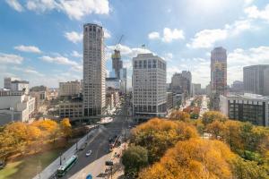 a view of a city with tall buildings and a street at The Nest At Twelve in Detroit
