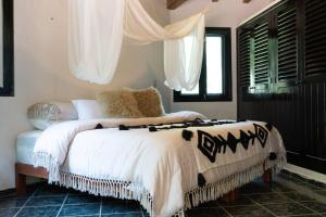 Postel nebo postele na pokoji v ubytování The Retreat - 3 villas + 40 fotografií