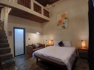 Postel nebo postele na pokoji v ubytování Mini Village