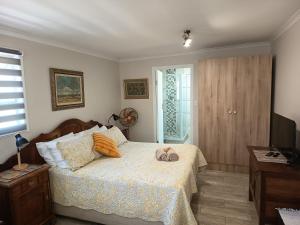 Postel nebo postele na pokoji v ubytování Akkerhuys Guest House