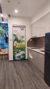 Kuchyň nebo kuchyňský kout v ubytování Luxhomes Tonkin2 Vinhomes Smart City