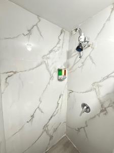 Vannituba majutusasutuses San Juan Oasis C3 Centrally located in front of the airport +10 fotot