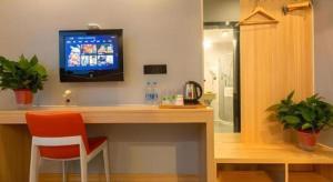 Φωτογραφία από το άλμπουμ του Shell Hotel Suzhou Zhangjiagang Jingang Town Central Plaza σε Xiwujieqiao