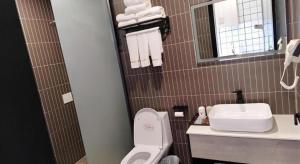 Koupelna v ubytování Jun Hotel Shanxi Linfen Hongdong County Dahuaishu Xungen Jizhuyuan + 93 fotografií